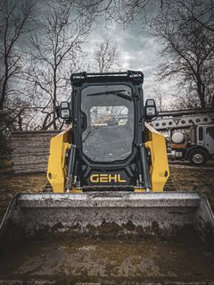 Gehl VT230 track loader working on the job site